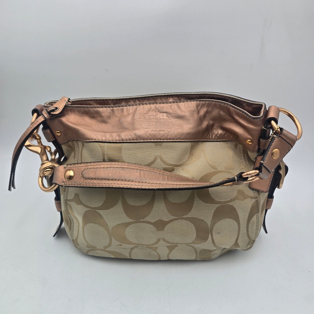 Coach Zoe 12657 Signature Khaki Canvas Rose Gold Metallic Leather Hobo Bag